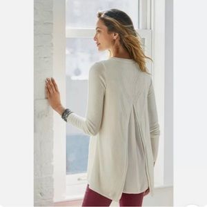 Soft surrounding split back sweater in cream